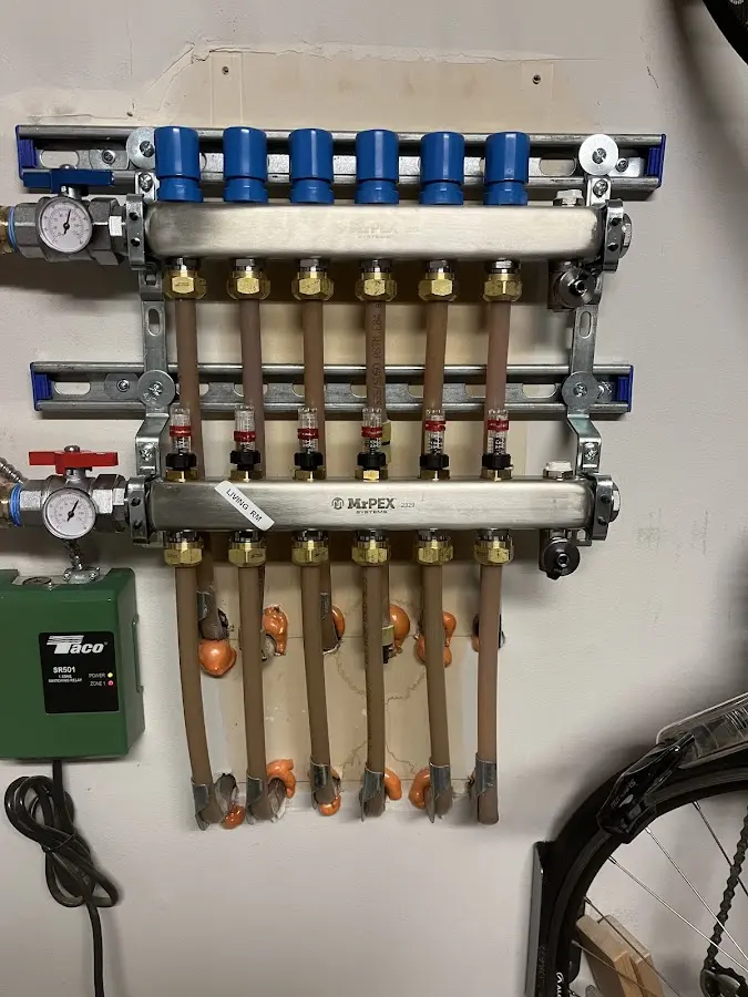 Plumber performing Water Heater Repair at a residential property in Kiryas Joel